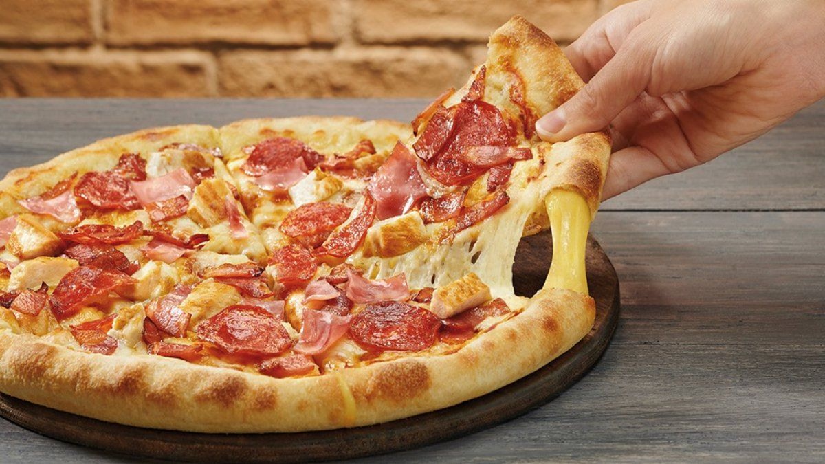 La cadena de Domino’s Pizza te va a pagar para no llevarte tu pizza